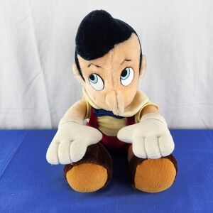 Disneyland Walt Disney World Exclusive Pinocchio Stuffed Plush Doll 10" Sitting
